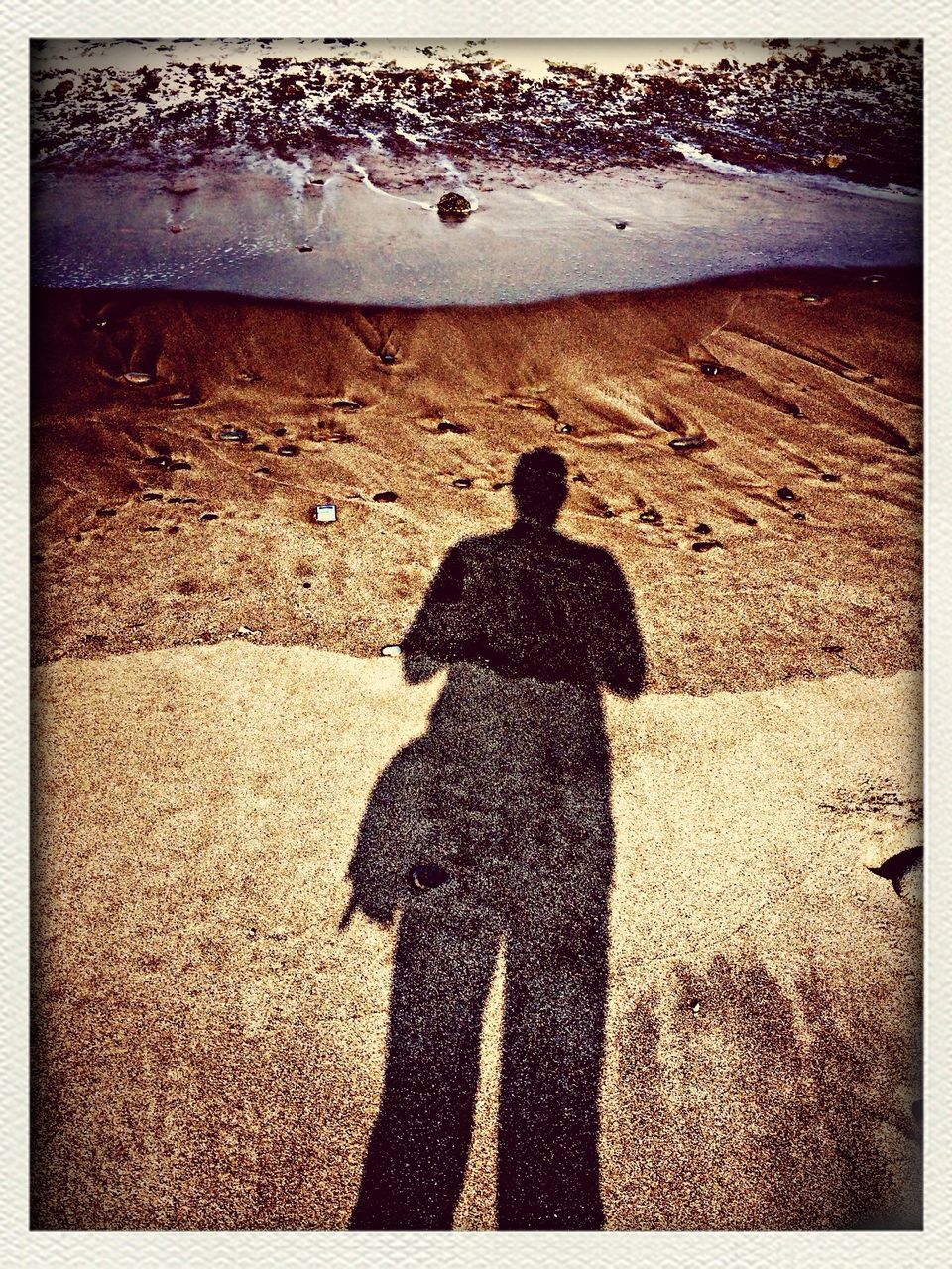 transfer print, auto post production filter, high angle view, sand, beach, low section, shadow, person, sunlight, textured, outdoors, day, close-up, ground, human foot, water, nature