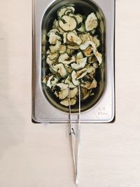 High angle view of dried cucumber in bowl on table