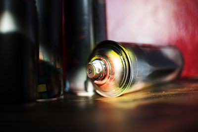 Close-up of glass bottle on table