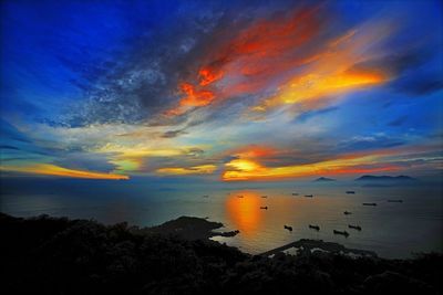 Scenic view of sea against sky at sunset