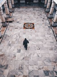 High angle view of text on tiled floor