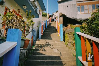 Staircase amidst buildings