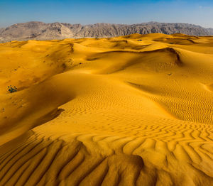 Scenic view of desert against sky