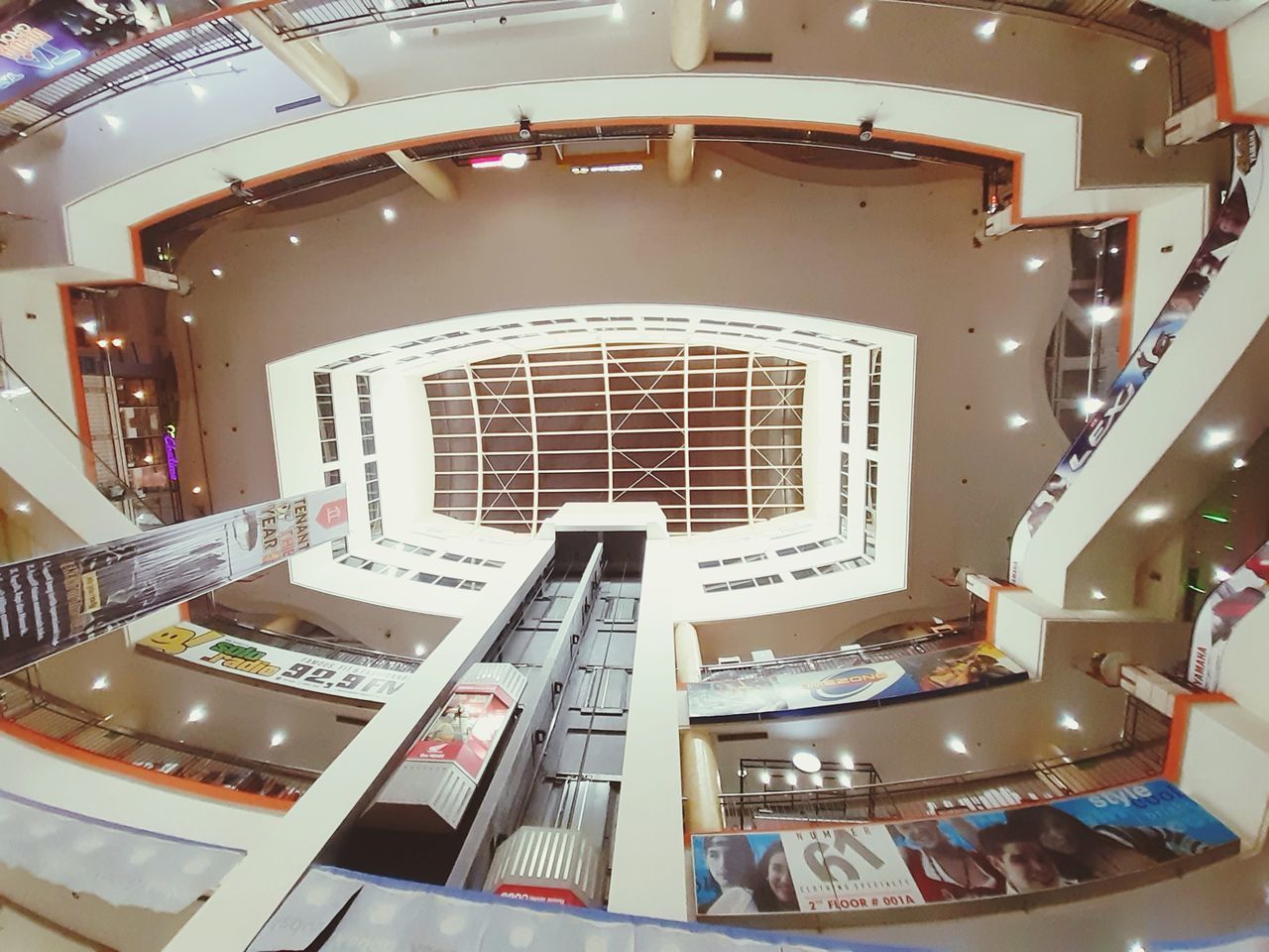 HIGH ANGLE VIEW OF ILLUMINATED LIGHTING EQUIPMENT ON TABLE