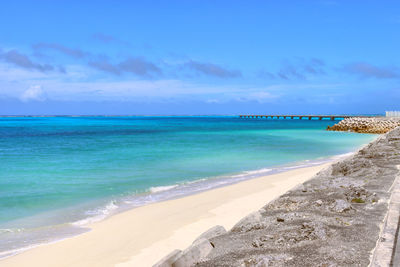 Scenic view of beach against sky in okinawa, japan