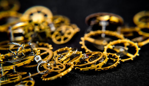 Close view of a vintage toothed wheels watch mechanism with jewels