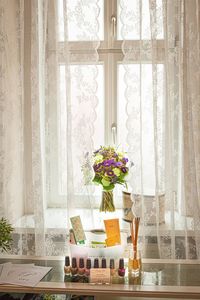 Flower vase on window sill