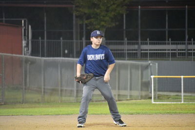 Full length of boy standing on field