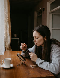 Young woman using mobile phone