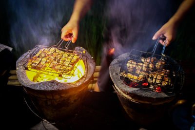 Midsection of person preparing food