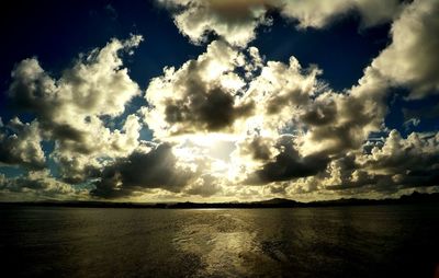 Scenic view of sea against cloudy sky