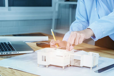 Man using laptop on table