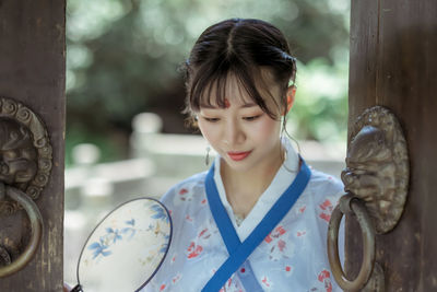 Woman in kimono at entrance