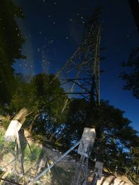 Low angle view of trees against sky