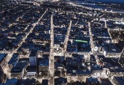 High angle view of illuminated city at night