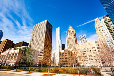 Low angle view of buildings against blue sky