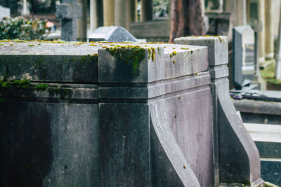 Close-up of metallic structure in cemetery