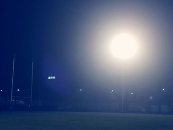 Illuminated street light at night