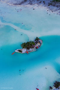 High angle view of people on sea shore