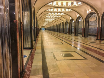 Interior of illuminated railroad station building