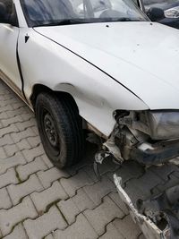 Damaged car on street