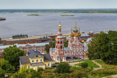 High angle view of buildings against sea