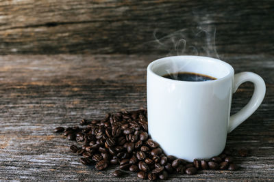 Close-up of coffee cup on table