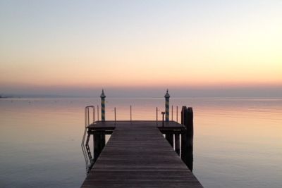 Scenic view of calm sea at sunset