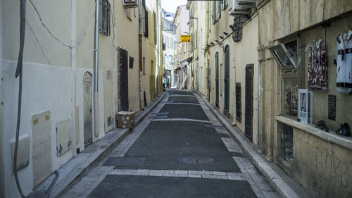 Alley amidst buildings in city
