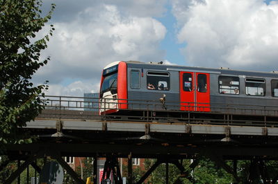 Train on railroad track against sky
