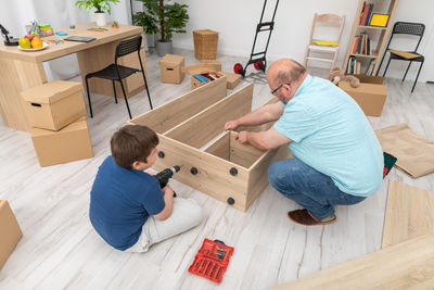 Side view of man working at home