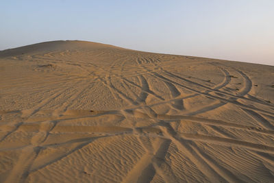 Scenic view of desert against clear sky