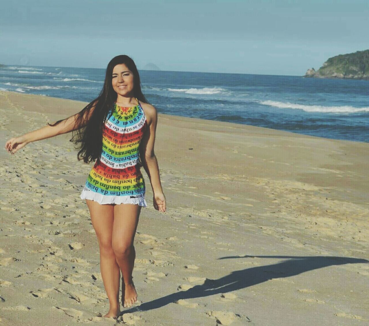 beach, sand, sea, shore, lifestyles, leisure activity, full length, water, horizon over water, vacations, casual clothing, person, young adult, standing, sky, young women, summer, sunlight