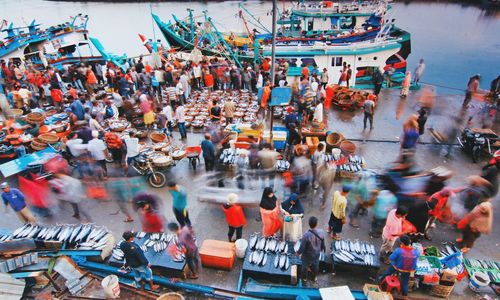 High angle view of people walking on street