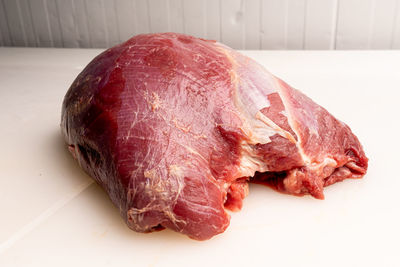 Close-up of meat on cutting board