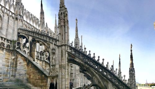 View of bridge against sky in city