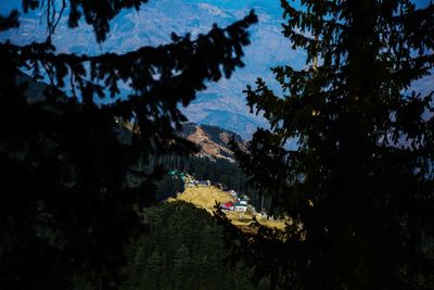 Scenic view of tree mountains against sky