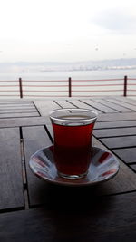 Close-up of coffee on table against sky