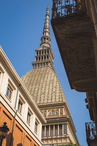 Low angle view of temple building against clear blue sky in turin