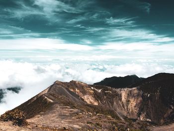Scenic view of arid landscape against sky