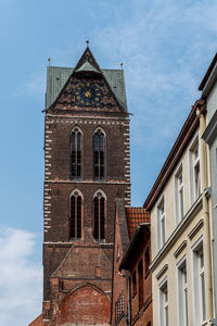 The tower of st mary church in historic centre of wismar, germany. 