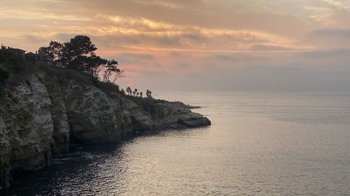 Scenic view of sea against sky during sunset
