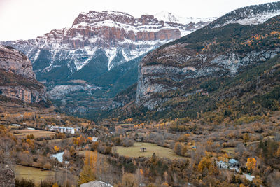 Scenic view of snowcapped mountains against sky