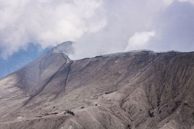 Scenic view of volcanic mountain against sky