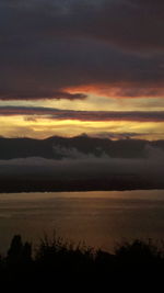 Scenic view of landscape against sky during sunset