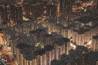 High angle view of city buildings at night