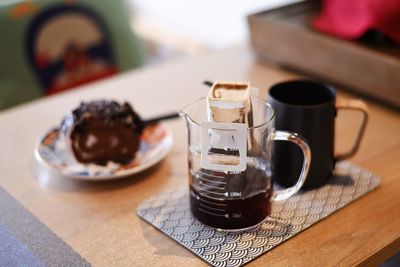 Close-up of coffee served on table