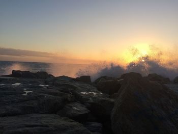 Scenic view of sea against sky during sunset