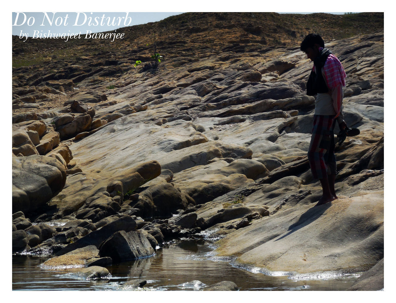 transfer print, lifestyles, leisure activity, full length, water, rock - object, auto post production filter, men, standing, rock formation, vacations, rear view, casual clothing, mountain, tourist, rock, tranquility, tranquil scene