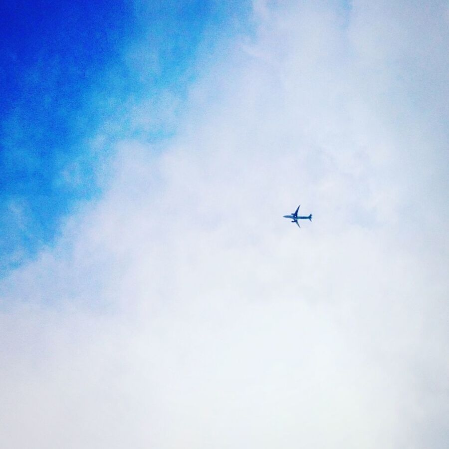 sky, low angle view, flying, airplane, cloud - sky, air vehicle, transportation, mid-air, day, no people, outdoors, nature, fighter plane